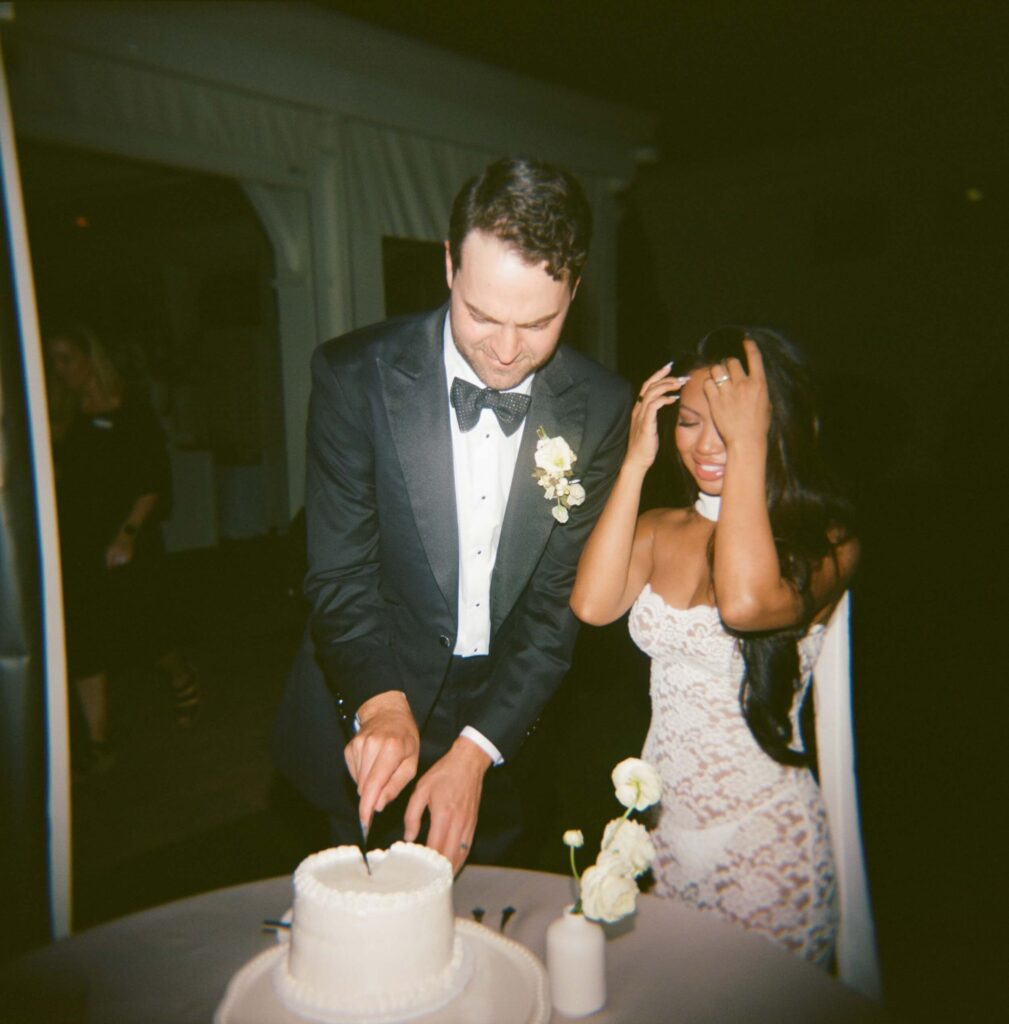 Newlyweds cut the cake