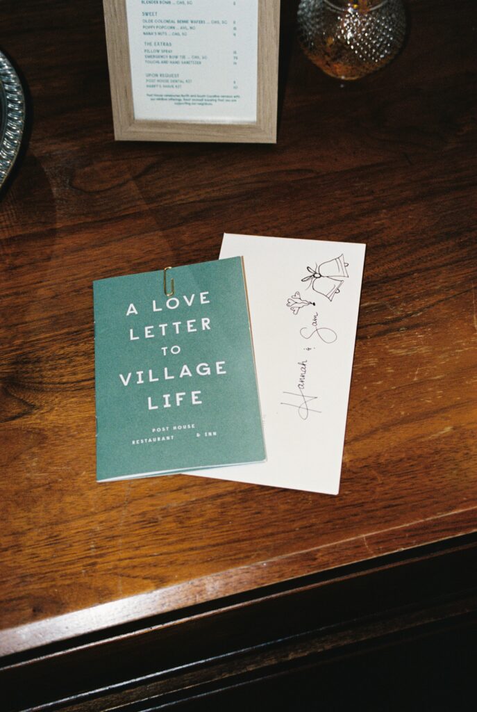 Details of cards and gifts on a wooden table