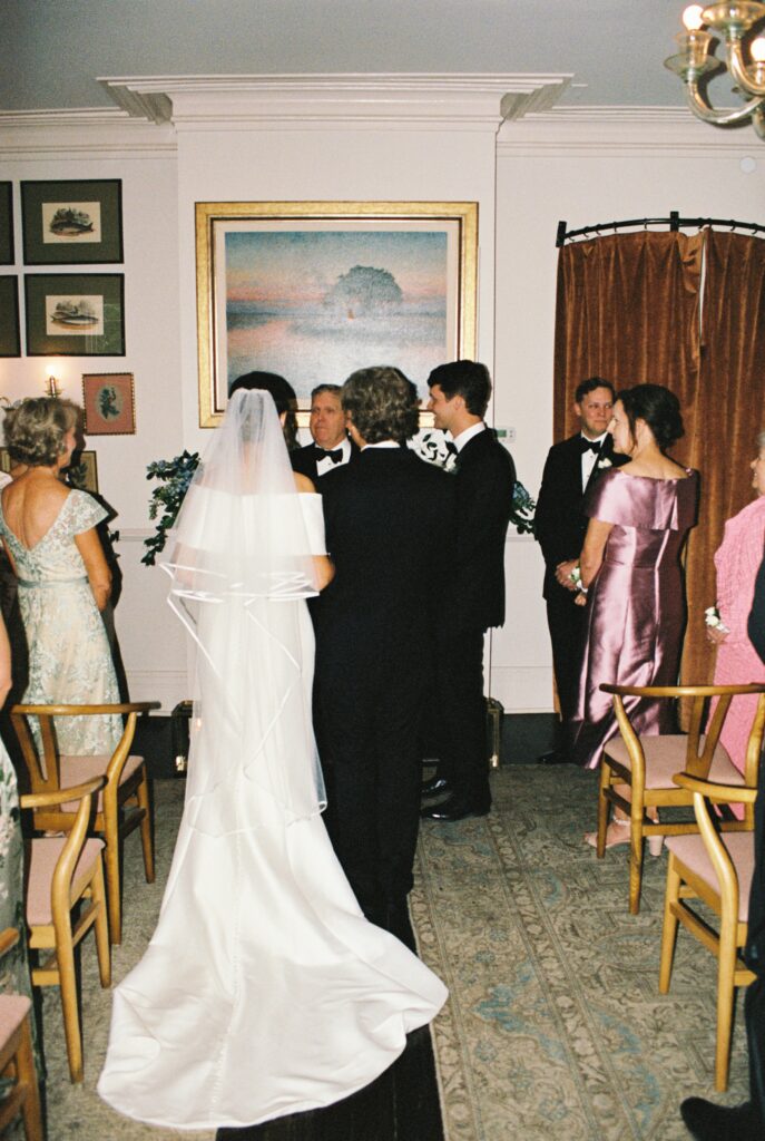 A dad walks his daughter down the aisle for her Post House Inn wedding ceremony