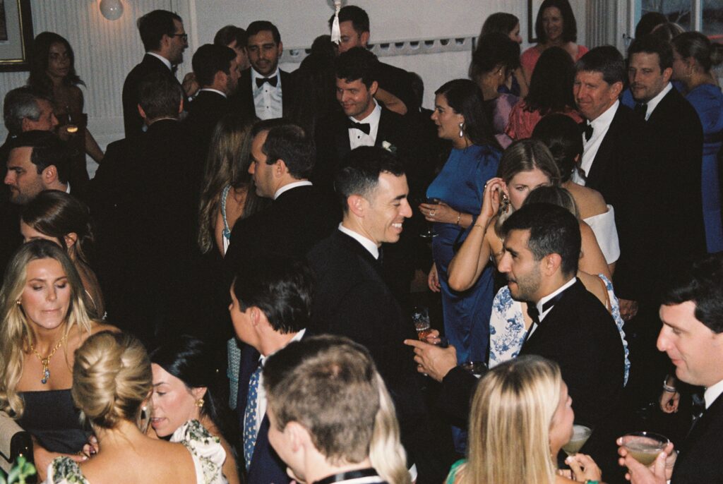 A look down onto a happy and lively wedding reception at the Post House Inn wedding venue