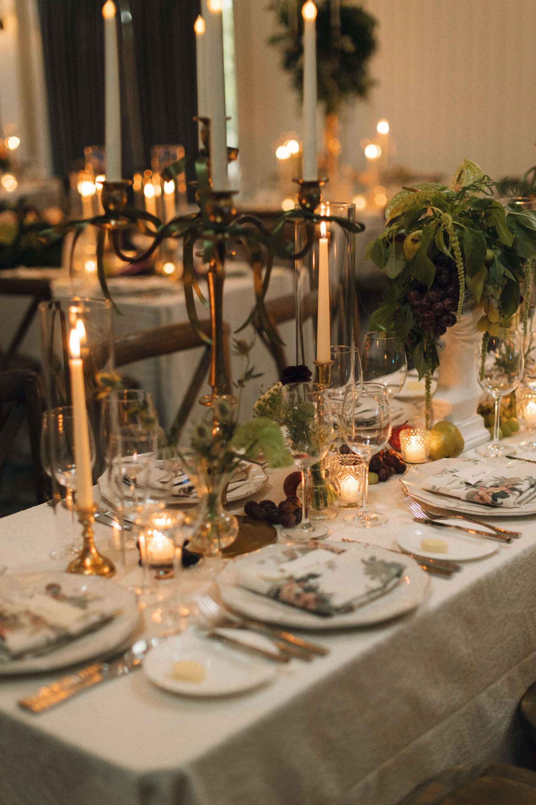 A look at a montage palmetto bluff wedding reception table with tall candelabras