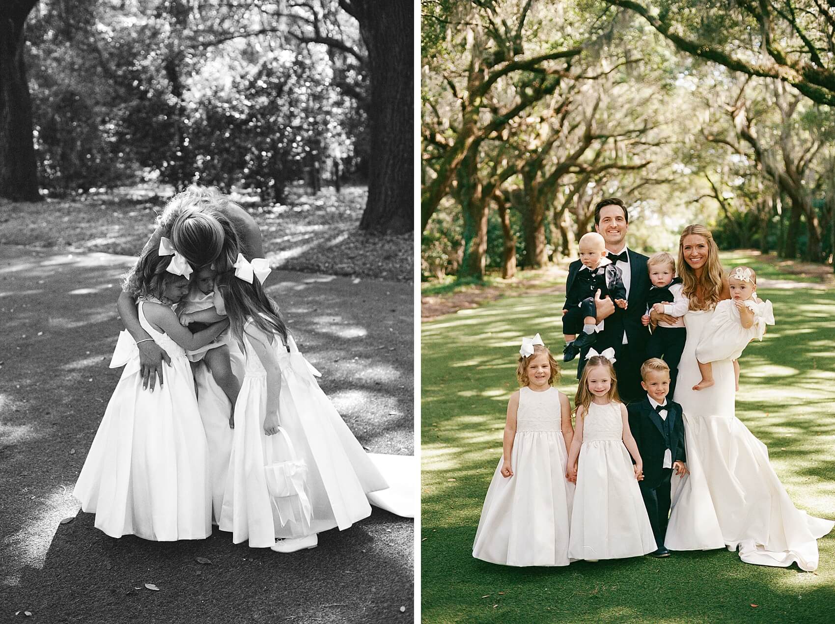 A bride hugs three toddler girls next to her and groom holding babies in an oak tunnel at their legare waring house wedding